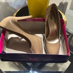 Nude patent leather heels